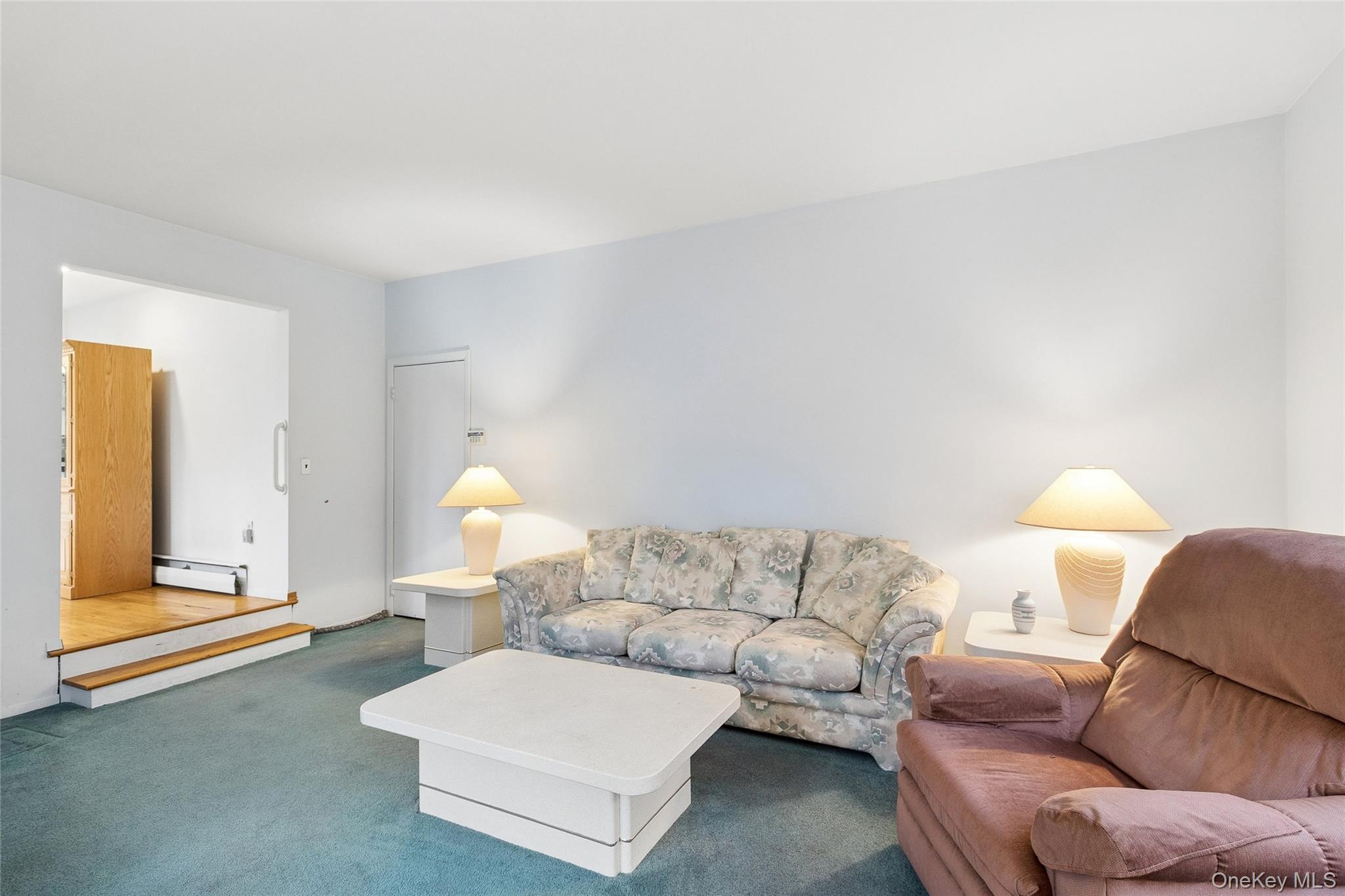 72 Jarvin Road Port Jefferson Station, NY 11776 - Photo 11 of 29 a living room with furniture and a window