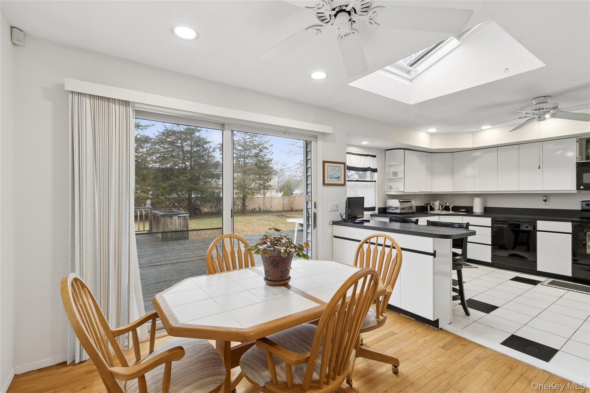 72 Jarvin Road Port Jefferson Station, NY 11776 - Photo 13 of 29 a dining room with furniture and a view of kitchen