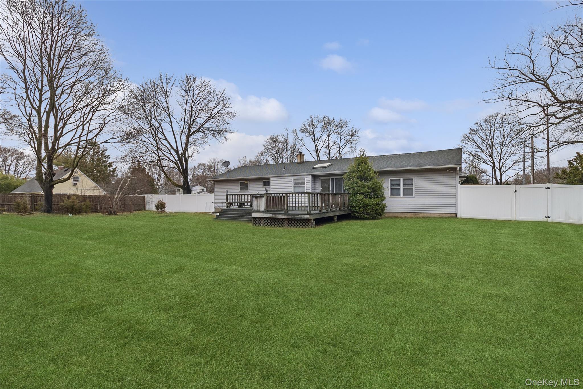 72 Jarvin Road Port Jefferson Station, NY 11776 - Photo 2 of 29 a view of a house with a back yard