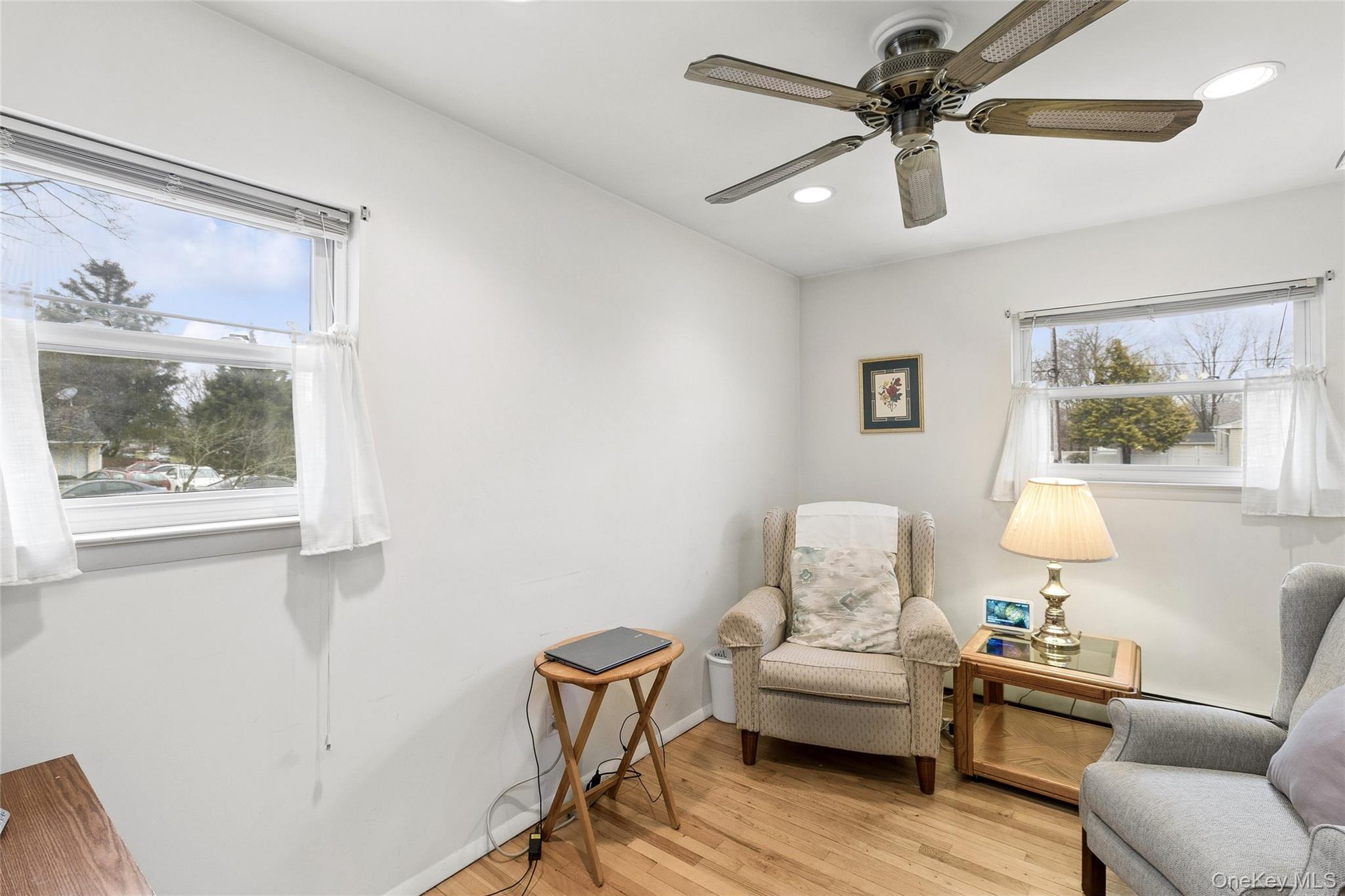 72 Jarvin Road Port Jefferson Station, NY 11776 - Photo 23 of 29 a living room with furniture and a window
