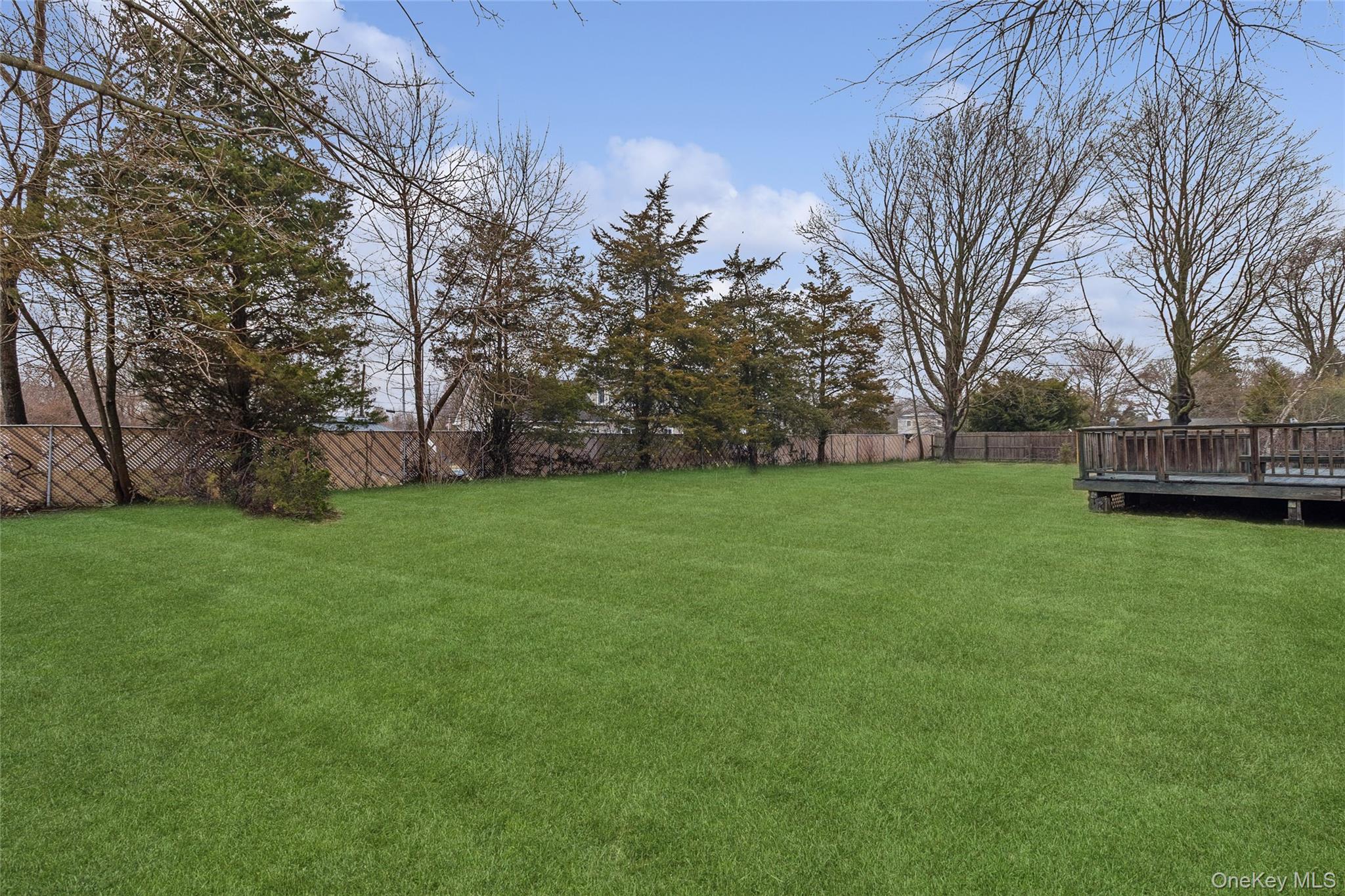 72 Jarvin Road Port Jefferson Station, NY 11776 - Photo 3 of 29 a view of a house with a big yard