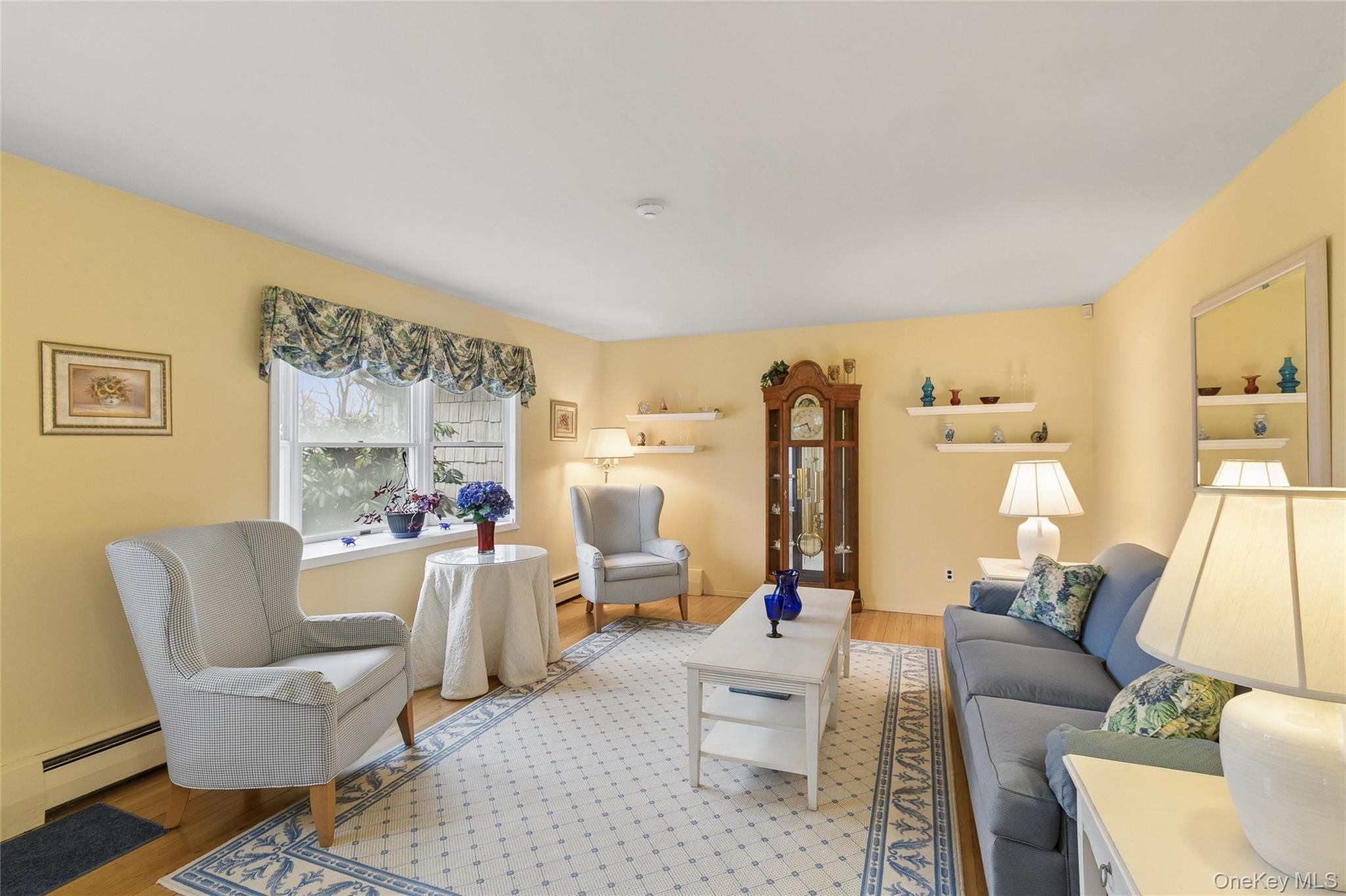72 Jarvin Road Port Jefferson Station, NY 11776 - Photo 5 of 29 a living room with furniture and a table