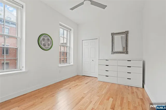 a view of a room with cabinet and a window