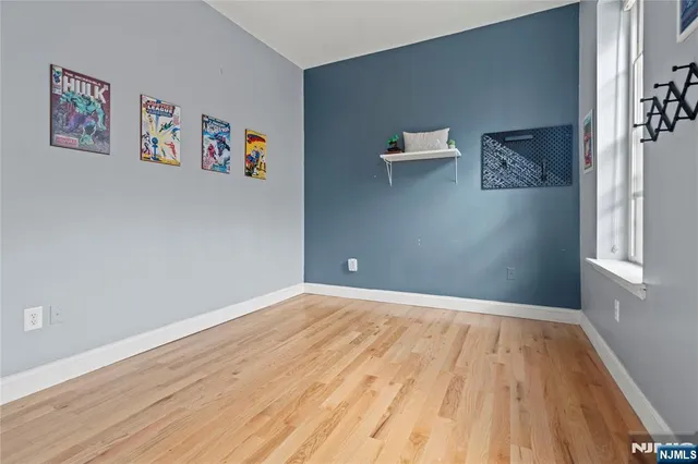a view of a big room with wooden floor