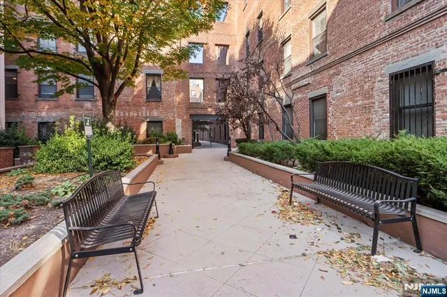 a view of a patio with a yard