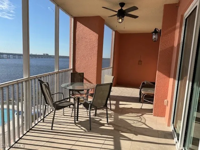 a view of a balcony with furniture