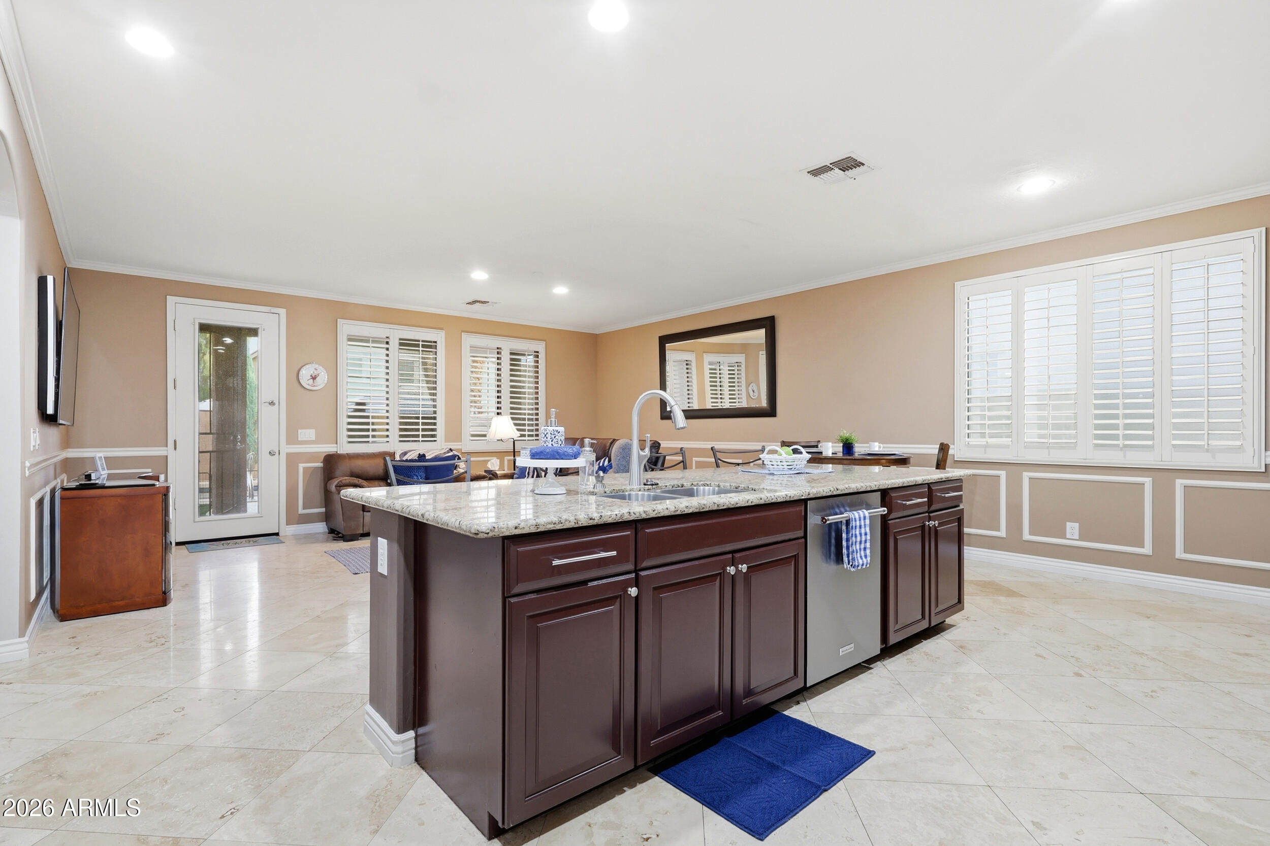 7721 South 71st Avenue Laveen, AZ 85339 - Photo 13 of 58 great room exits to covered patio