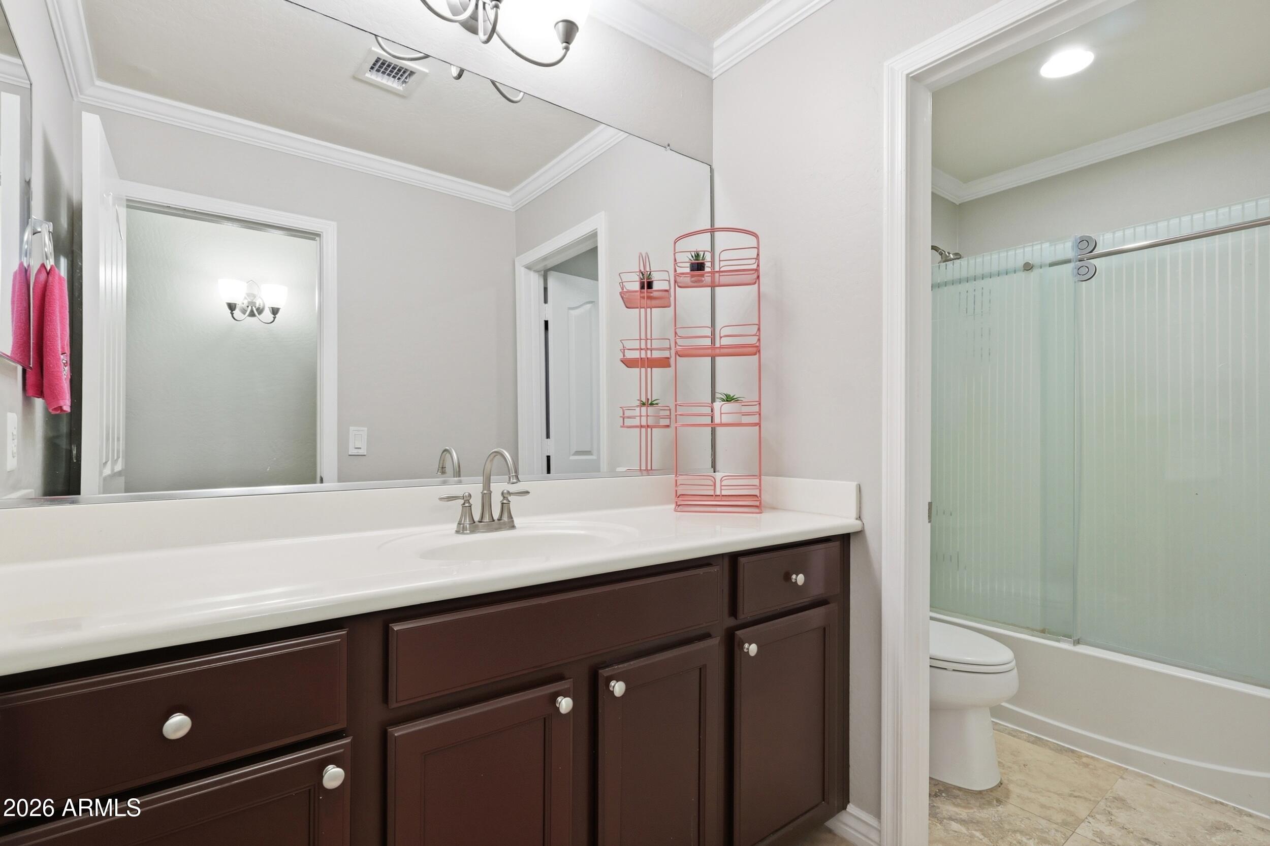 7721 South 71st Avenue Laveen, AZ 85339 - Photo 40 of 58 hall bath upstairs, split style