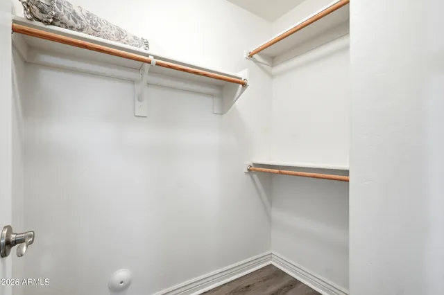 an aerial view of a house with a garden and plants