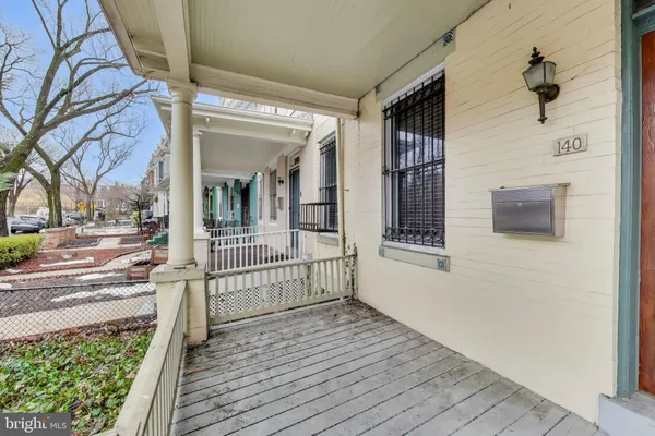 a view of a house with a porch