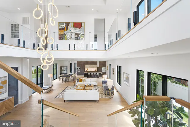 a bedroom with a large bed and a large window