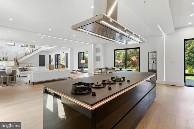 a view of a dining room with furniture and a window