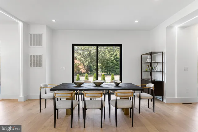 a view of a living room and dining room