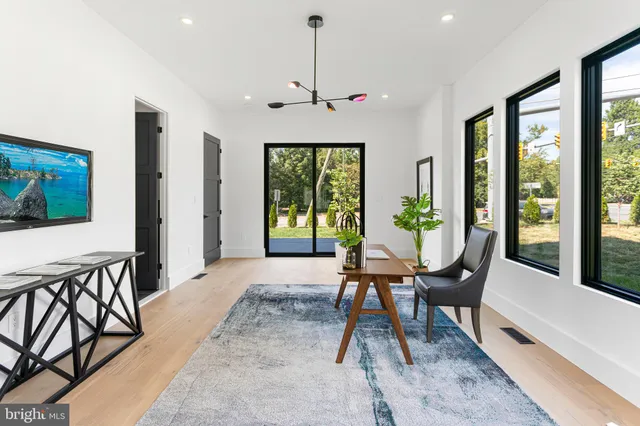 a spacious bedroom with a large bed and a window