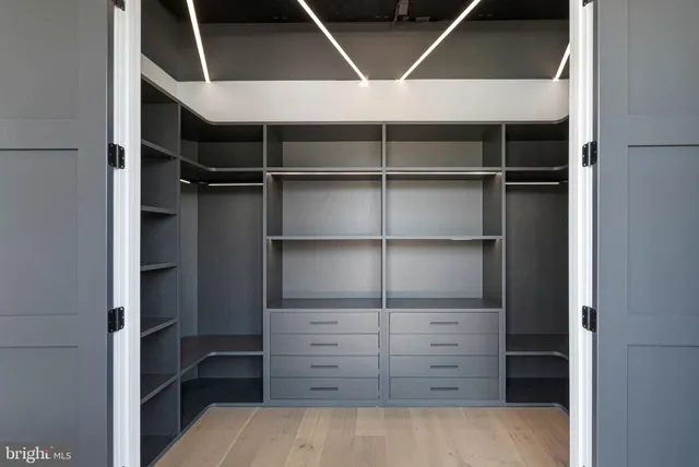 a bathroom with a shower and a bath tub