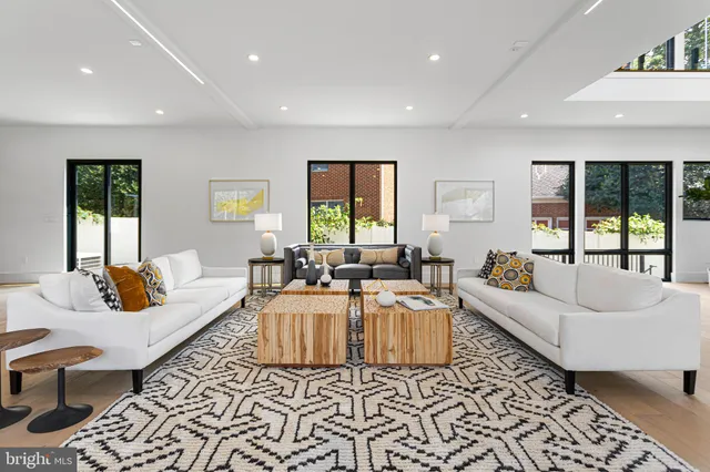 a room with furniture and a large window