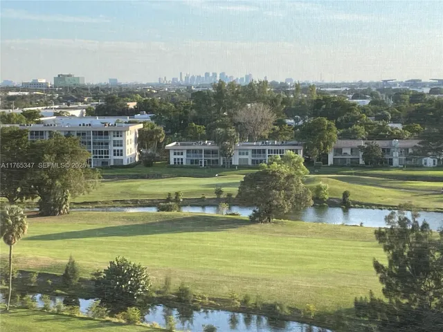 a view of a swimming pool with a lake view