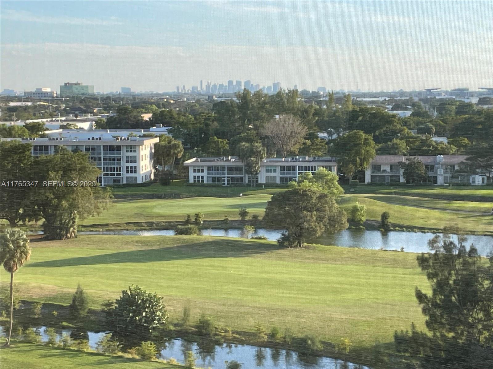 a view of a swimming pool with a lake view