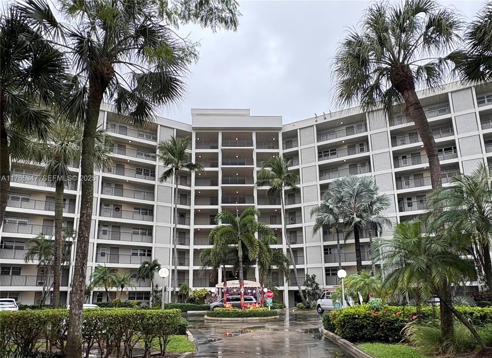 2681 South Course Drive, Unit 912 Pompano Beach, FL 33069 - Photo 2 of 44 a view of a multi story building