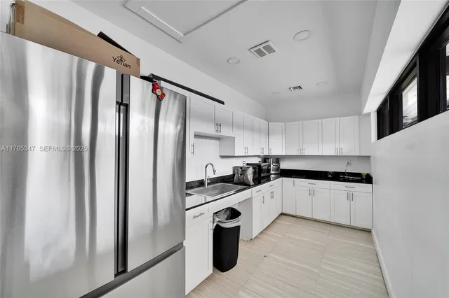 a view of swimming pool and an outdoor seating