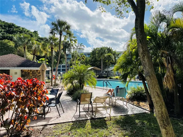 a view of an ocean yard and outdoor seating