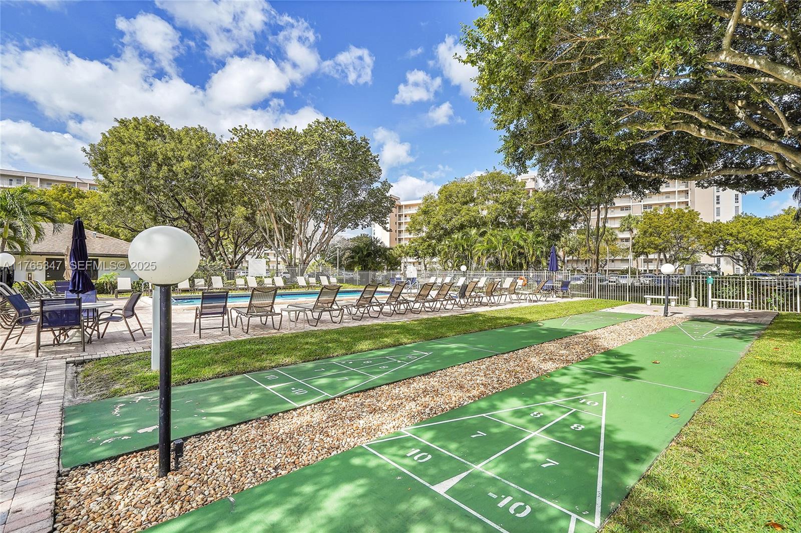 2681 South Course Drive, Unit 912 Pompano Beach, FL 33069 - Photo 41 of 44 a view of a park