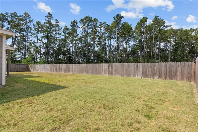 a view of outdoor space and yard