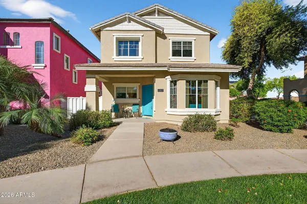 a front view of a house with a yard