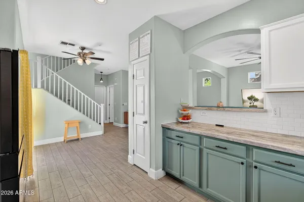 a kitchen with a stove and a microwave