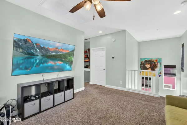 a view of a livingroom with furniture and window