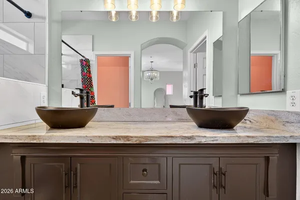 a kitchen with counter top space cabinets and stainless steel appliances
