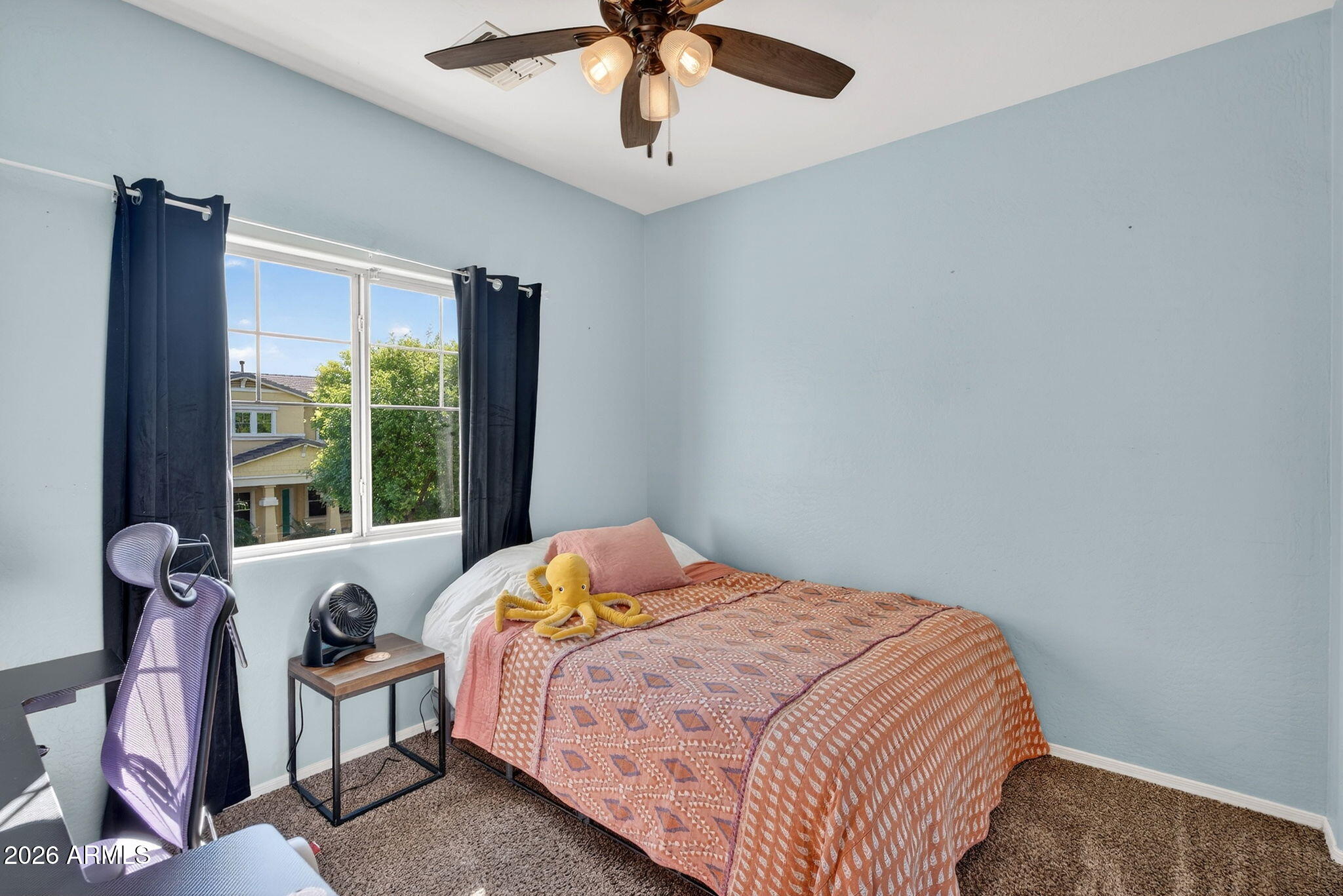 1317 South Banning Street Gilbert, AZ 85296 - Photo 25 of 46 a bedroom with bed and a window
