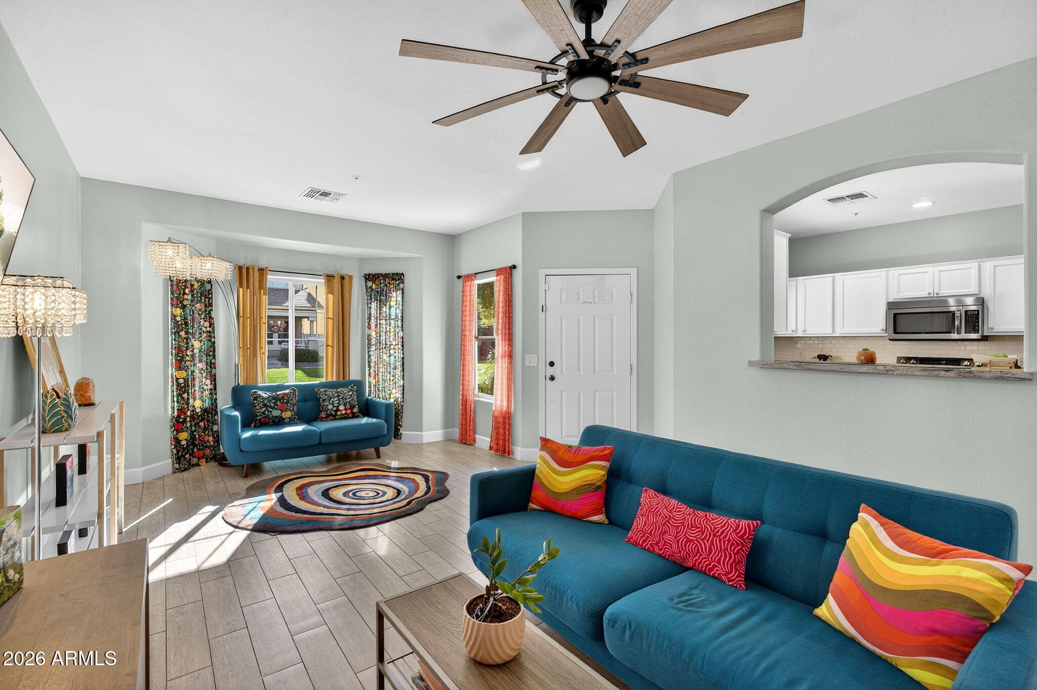1317 South Banning Street Gilbert, AZ 85296 - Photo 2 of 46 a living room with furniture and a flat screen tv