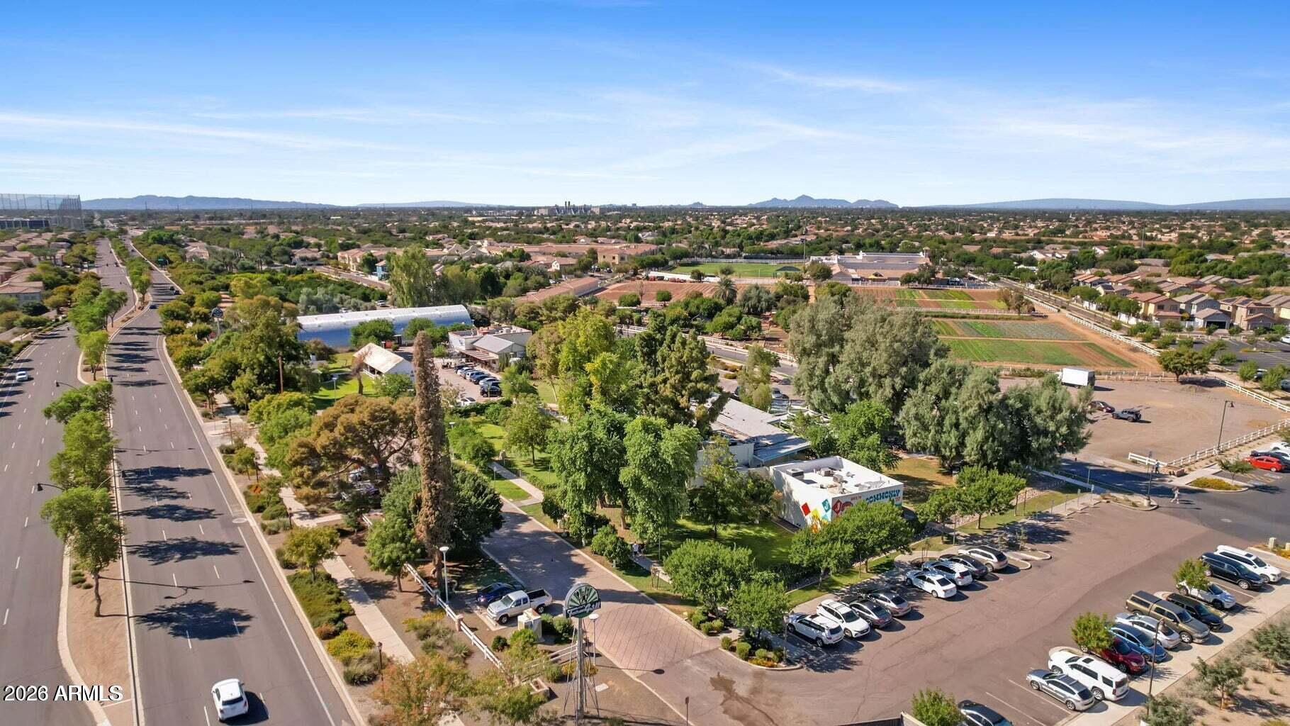 1317 South Banning Street Gilbert, AZ 85296 - Photo 31 of 46 an aerial view of a city with lots of residential buildings