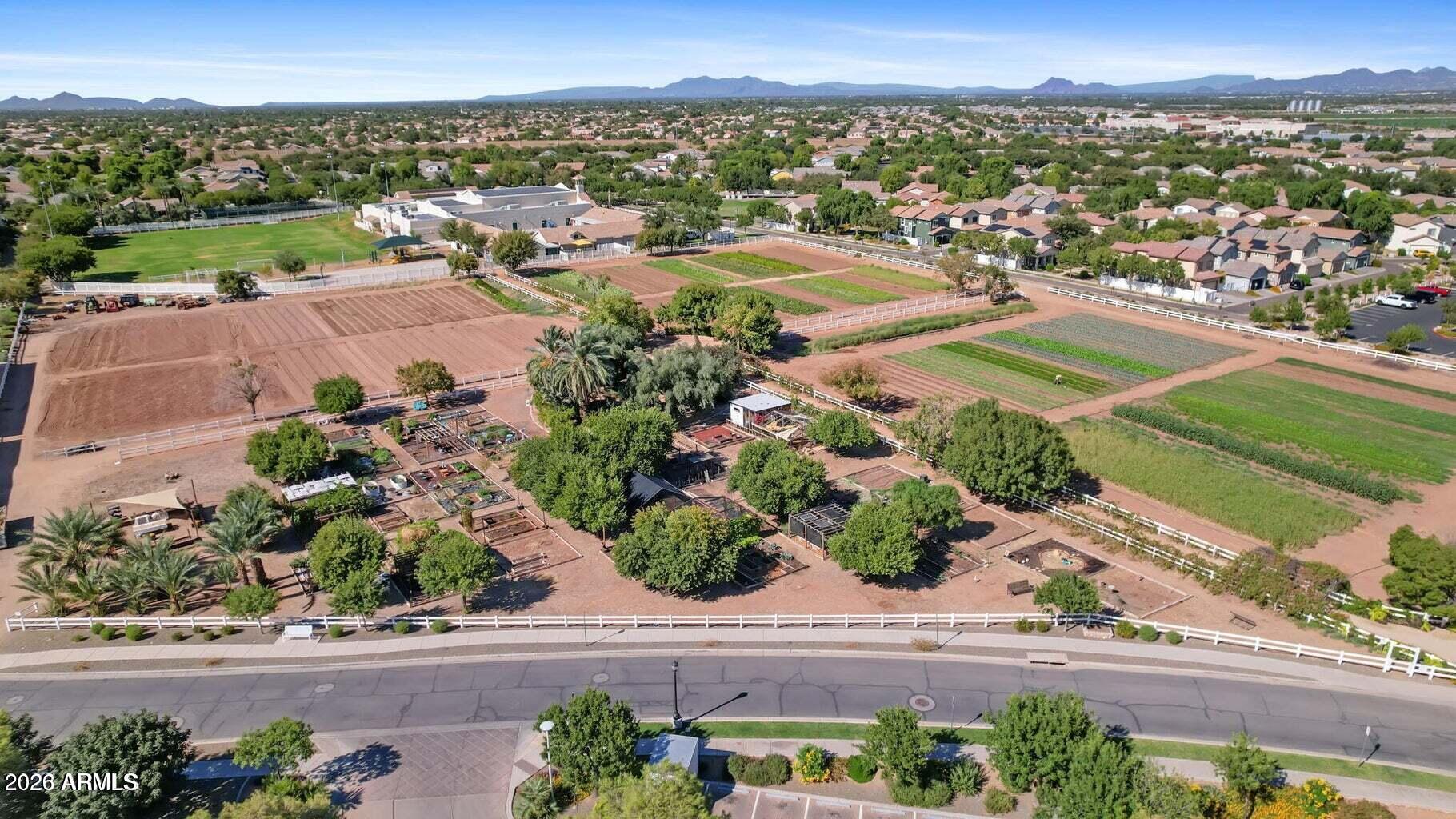 1317 South Banning Street Gilbert, AZ 85296 - Photo 34 of 46 an aerial view of residential houses with outdoor space