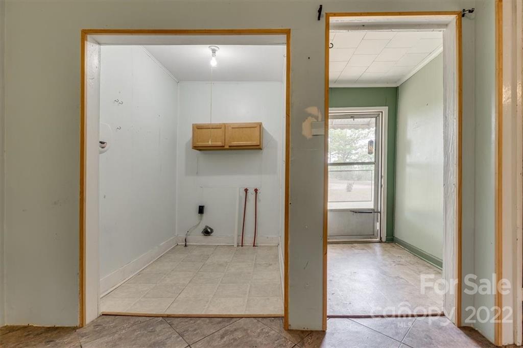 4571 Wylies Mill Road Edgemoor, SC 29712 - Photo 15 of 24 a view of a hallway with a room and front door