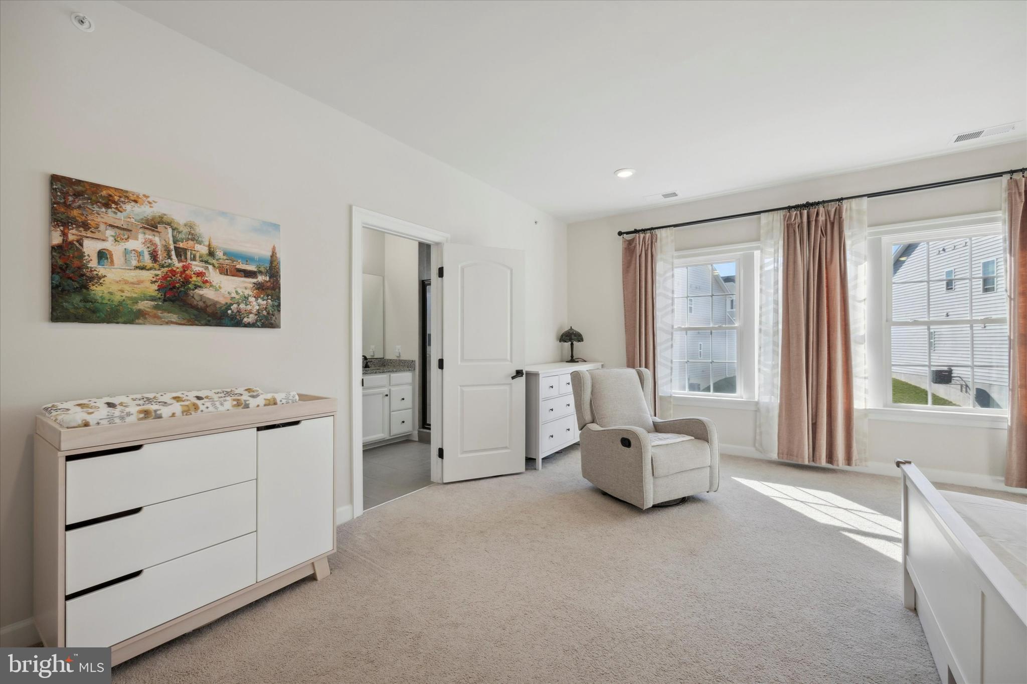 831 Stonecliffe Road Malvern, PA 19355 - Photo 14 of 32 a hallway with a couch and dresser