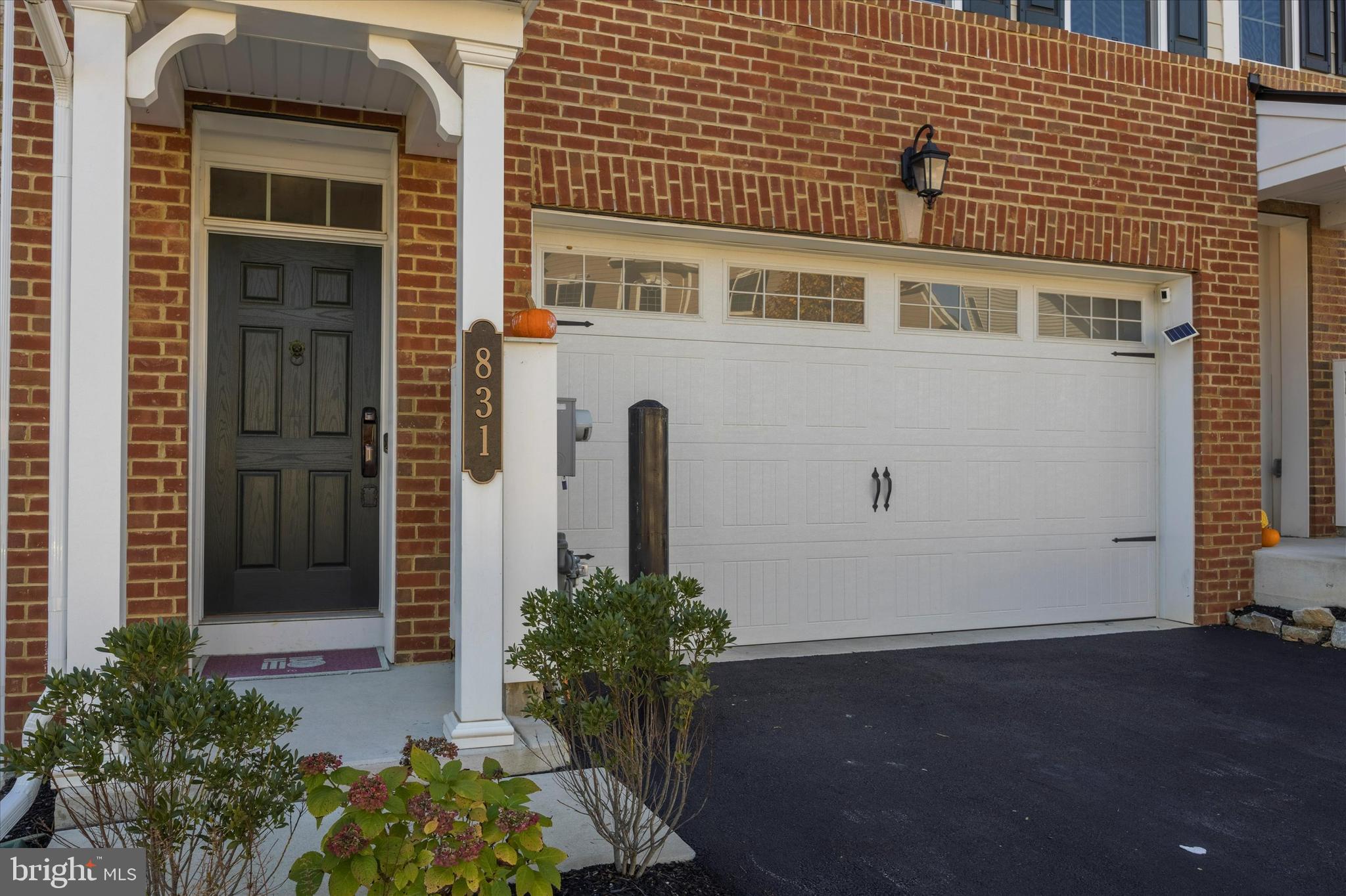 831 Stonecliffe Road Malvern, PA 19355 - Photo 2 of 32 a front view of a house with a yard