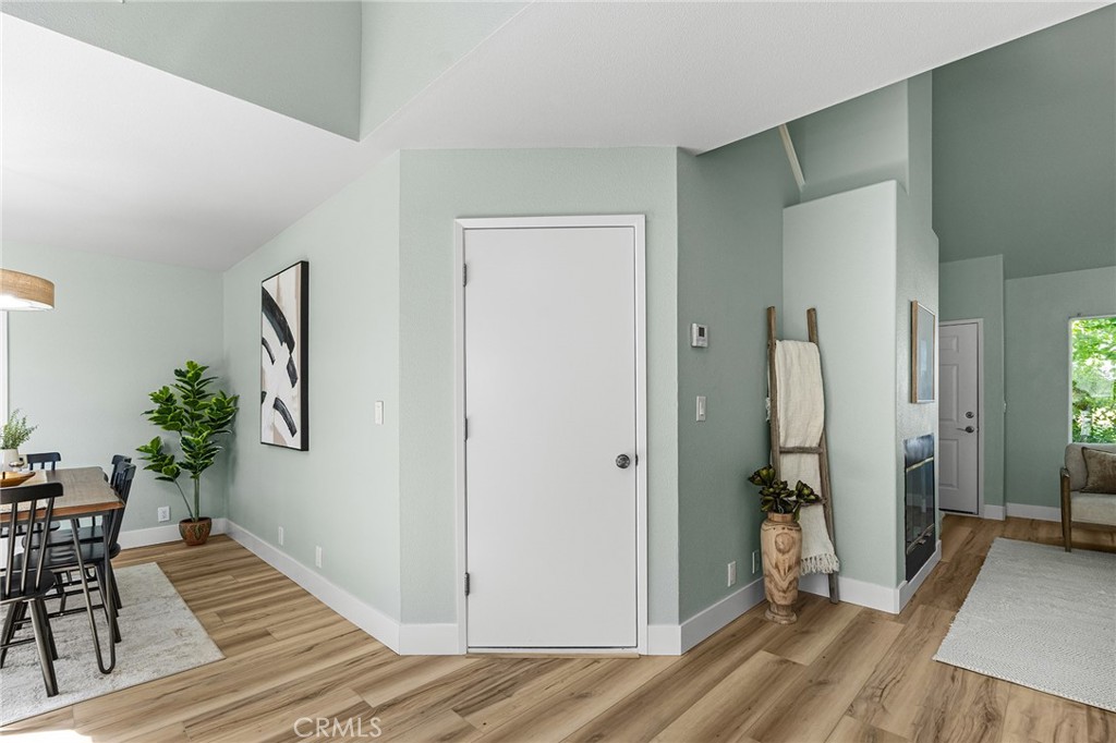 1572 Arch Way Chico, CA 95973 - Photo 11 of 43 a view of a hallway with furniture and wooden floor
