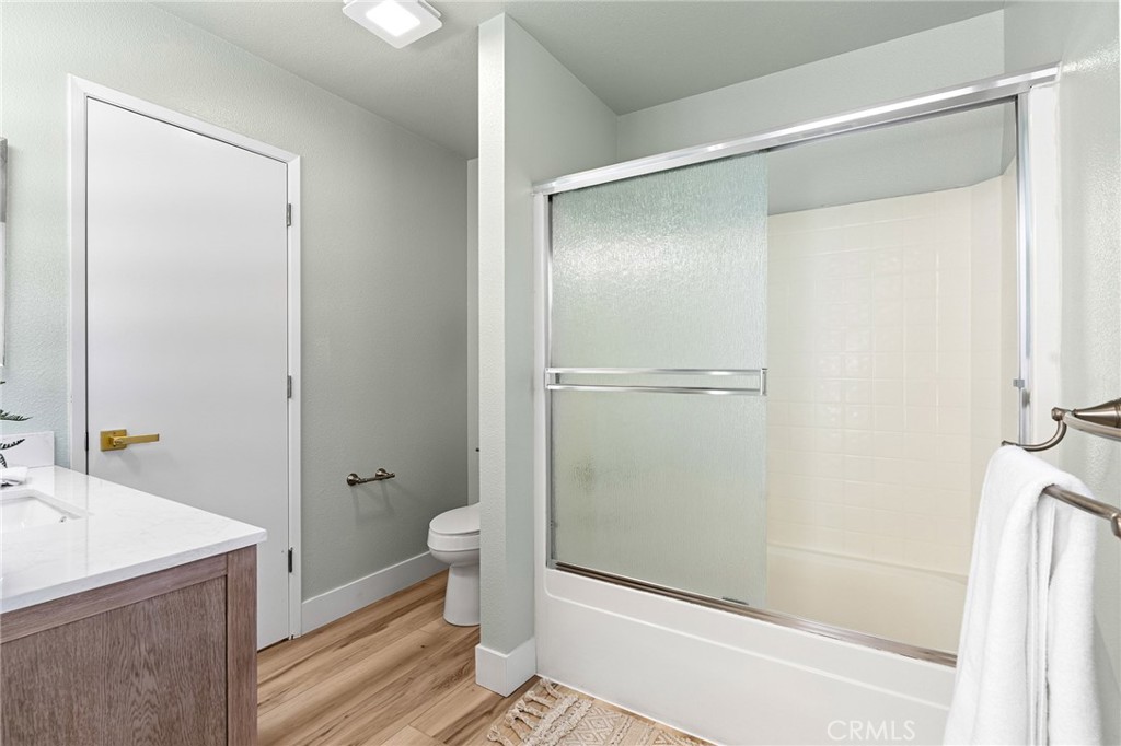1572 Arch Way Chico, CA 95973 - Photo 16 of 43 a bathroom with a shower and a toilet