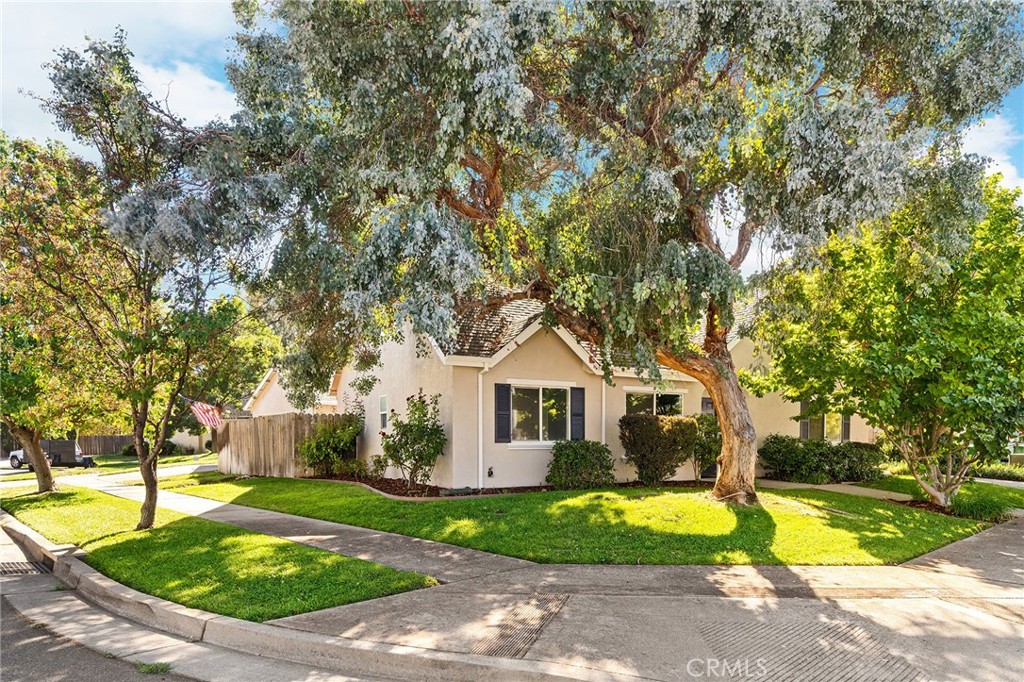 1572 Arch Way Chico, CA 95973 - Photo 2 of 43 a front view of house with yard and green space