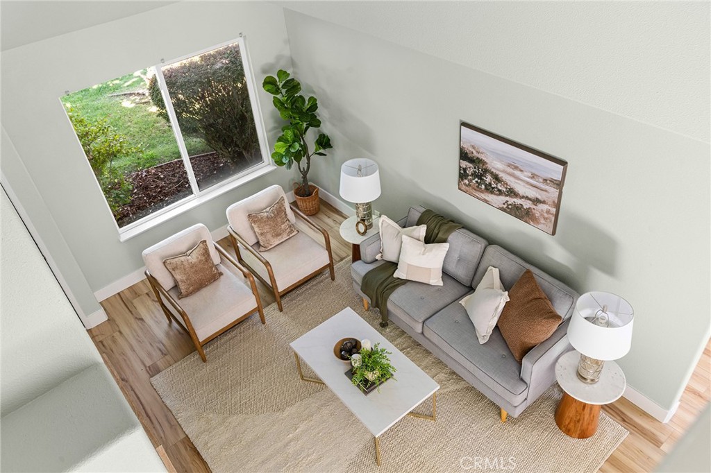 1572 Arch Way Chico, CA 95973 - Photo 22 of 43 a living room with furniture and a window