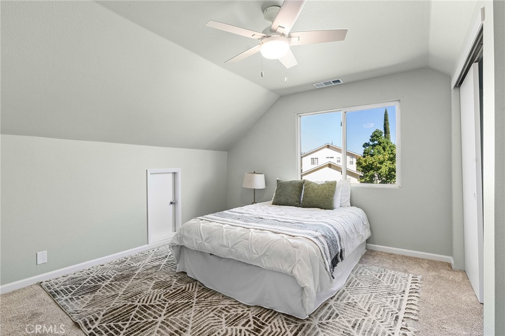 1572 Arch Way Chico, CA 95973 - Photo 27 of 43 a bedroom with a bed and a window