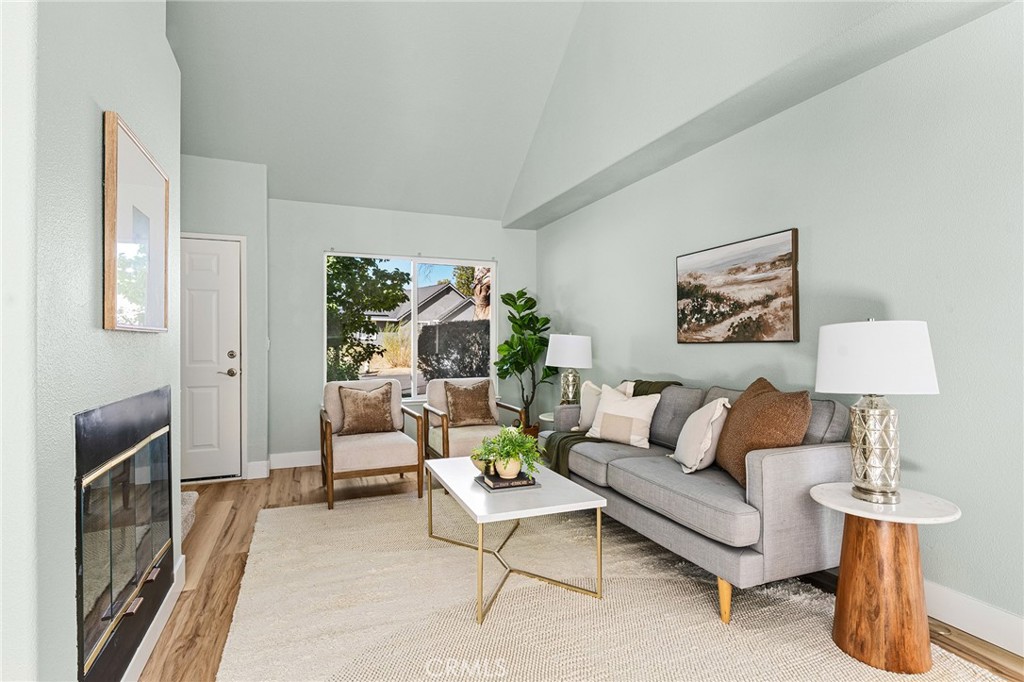 1572 Arch Way Chico, CA 95973 - Photo 3 of 43 a living room with furniture and a lamp