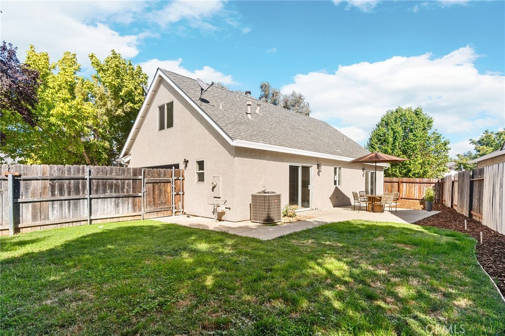 1572 Arch Way Chico, CA 95973 - Photo 32 of 43 a front view of house with a garden and patio