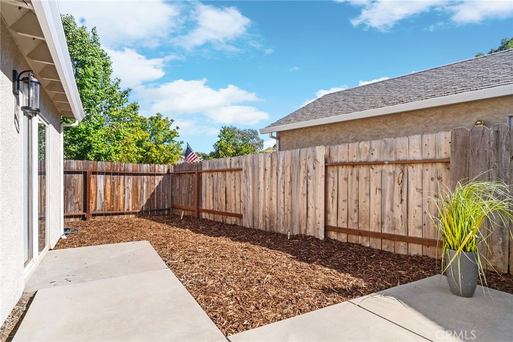 1572 Arch Way Chico, CA 95973 - Photo 35 of 43 a view of a backyard with wooden fence