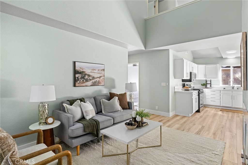 1572 Arch Way Chico, CA 95973 - Photo 7 of 43 a living room with furniture and kitchen view