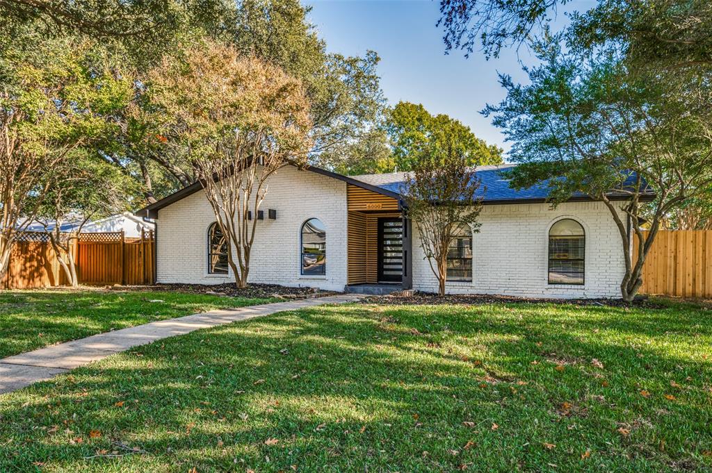 View of front of property featuring brick siding