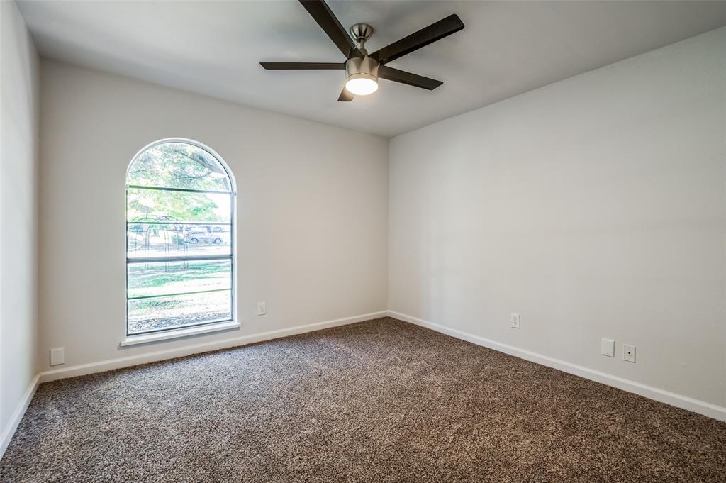 6000 Blue Ridge Trail Plano, TX 75023 - Photo 13 of 25 Spare room featuring carpet and ceiling fan