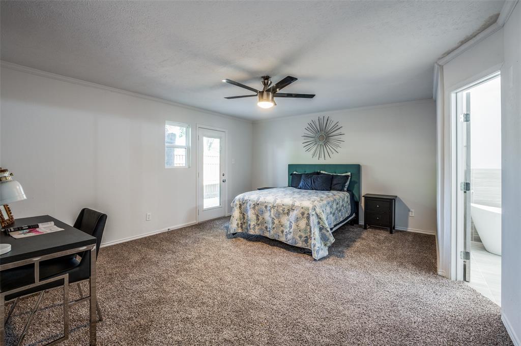 6000 Blue Ridge Trail Plano, TX 75023 - Photo 16 of 25 Carpeted bedroom with ornamental molding, a ceiling fan, a textured ceiling, and access to exterior